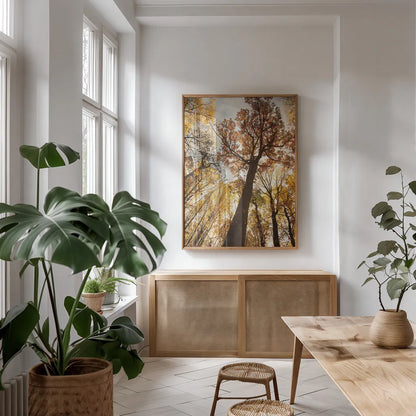 Towering Trees I by Aledanda. shown as a print in a natural wood frame in a dining room. Available as a archival giclee rolled canvas, fine art paper, or poster print. SKU 53649h.