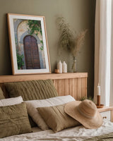 Venice Doorway by Aledanda. shown as a paper print in a natural frame. Available as a archival giclee rolled canvas, fine art paper, or poster print. SKU 58391h.