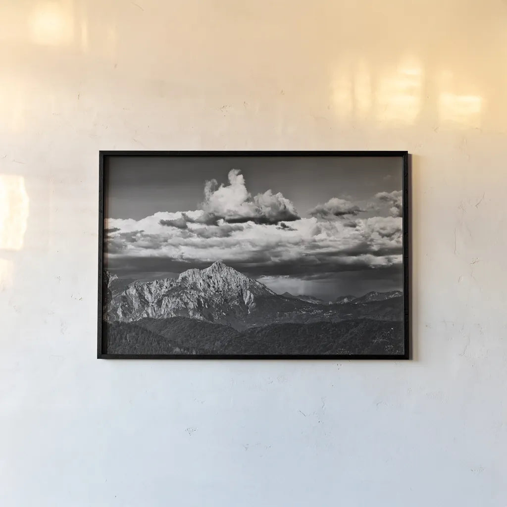 View of the Peaks by Aledanda. shown as a paper print in a black flame. Available as a archival giclee rolled canvas, fine art paper, or poster print. SKU 67689i.