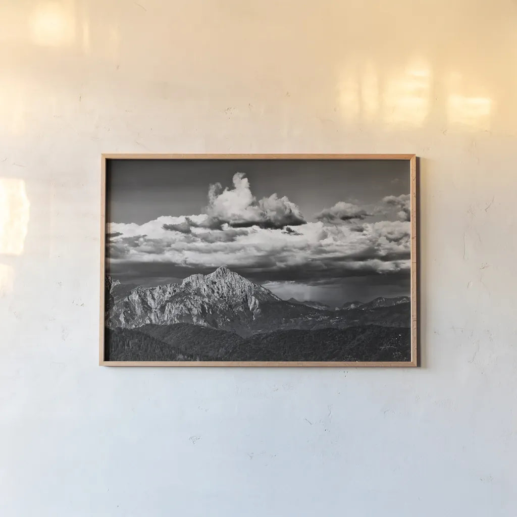 View of the Peaks by Aledanda. shown as a paper print in a natural frame. Available as a archival giclee rolled canvas, fine art paper, or poster print. SKU 67689i.