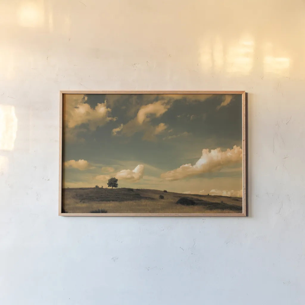 What Beautiful Clouds by Aledanda. shown as a paper print in a natural frame. Available as a archival giclee rolled canvas, fine art paper, or poster print. SKU 38325i.