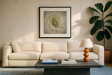 White Peony by Aledanda. Displayed in a glass frame with matte in a clean modern living room. Available as an archival giclee rolled canvas, fine art paper, or poster print. SKU 37450a.
