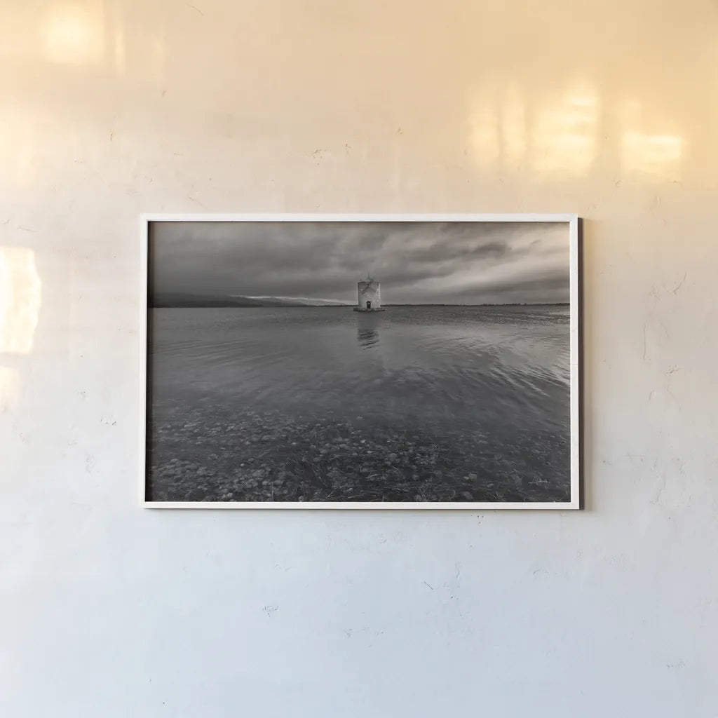 Windmill Island by Aledanda. shown as a paper print in a white frame. Available as a archival giclee rolled canvas, fine art paper, or poster print. SKU 75866i.