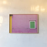Windows of Burano V by Aledanda. shown as a paper print in a natural frame. Available as a archival giclee rolled canvas, fine art paper, or poster print. SKU 41611i.