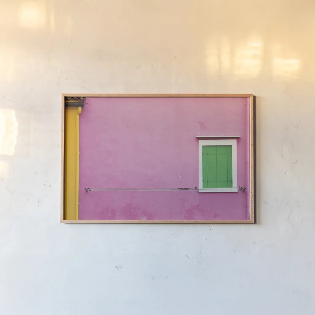 Windows of Burano V by Aledanda. shown as a paper print in a natural frame. Available as a archival giclee rolled canvas, fine art paper, or poster print. SKU 41611i.