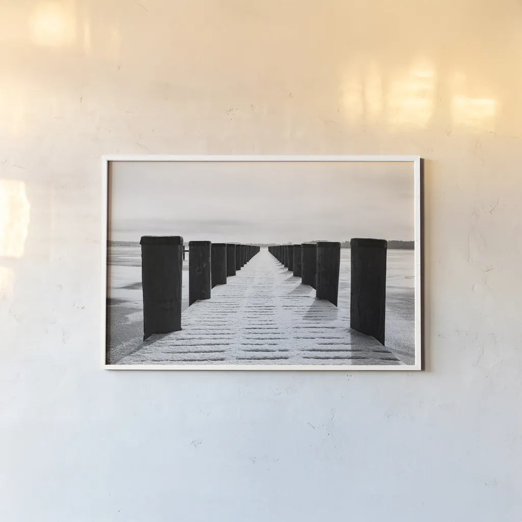 Winter Dock by Aledanda. shown as a paper print in a white frame. Available as a archival giclee rolled canvas, fine art paper, or poster print. SKU 64384i.