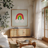 Bright Rainbow I by Ann Kelle. Shown in a natural wood frame in a cozy modern living room. Available as an archival giclee rolled canvas, fine art paper, or poster print. SKU 56492a.