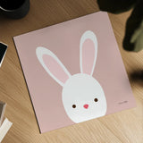 Cuddly Bunny Soft Pink by Ann Kelle. Shown as a detailed flat fine art print, highlighting archival giclee quality. Available as an archival giclee rolled canvas, fine art paper, or poster print. SKU 62025a.