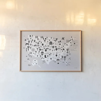 Fun USA Map BW by Ann Kelle. shown as a paper print in a natural frame. Available as a archival giclee rolled canvas, fine art paper, or poster print. SKU 66281i.