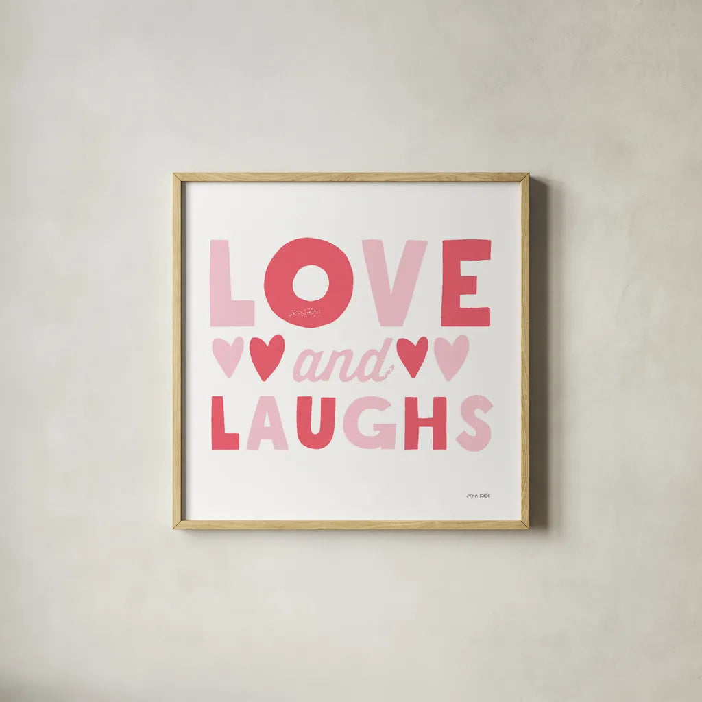 Love and Laughs Pink by Ann Kelle. Shown in a natural wood glass frame for a timeless modern aesthetic. Available as an archival giclee rolled canvas, fine art paper, or poster print. SKU 55602a.