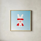 Rabbit Super Hero by Ann Kelle. Shown in a natural wood glass frame for a timeless modern aesthetic. Available as an archival giclee rolled canvas, fine art paper, or poster print. SKU 55595a.