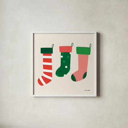 Three Stockings by Ann Kelle. Shown in a crisp white glass frame for a clean and minimalist style. Available as an archival giclee rolled canvas, fine art paper, or poster print. SKU 81237a.