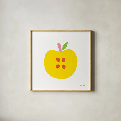 Yellow Apple by Ann Kelle. Shown in a natural wood glass frame for a timeless modern aesthetic. Available as an archival giclee rolled canvas, fine art paper, or poster print. SKU 55614a.