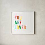 You are Loved by Ann Kelle. Shown in a crisp white glass frame for a clean and minimalist style. Available as an archival giclee rolled canvas, fine art paper, or poster print. SKU 56441a.