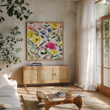 Annes Flowers II Crop by Anne Tavoletti. Shown in a natural wood frame in a cozy modern living room. Available as an archival giclee rolled canvas, fine art paper, or poster print. SKU 13944a.