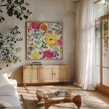 Annes Flowers III Crop by Anne Tavoletti. Shown in a natural wood frame in a cozy modern living room. Available as an archival giclee rolled canvas, fine art paper, or poster print. SKU 27935a.