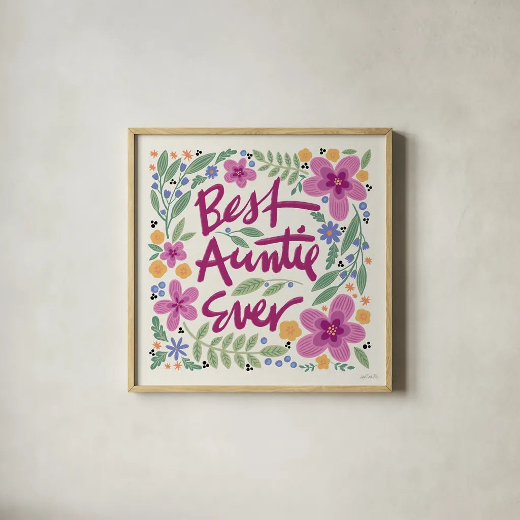 Best Auntie Ever I by Anne Tavoletti. Shown in a natural wood glass frame for a timeless modern aesthetic. Available as an archival giclee rolled canvas, fine art paper, or poster print. SKU 60895a.