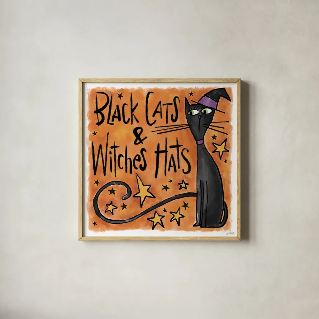 Black Cats and Witches Hats I by Anne Tavoletti. Shown in a natural wood glass frame for a timeless modern aesthetic. Available as an archival giclee rolled canvas, fine art paper, or poster print. SKU 73732a.