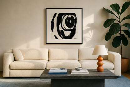 Black and White Abstract I by Anne Tavoletti. Displayed in a glass frame with matte in a clean modern living room. Available as an archival giclee rolled canvas, fine art paper, or poster print. SKU 77912a.