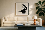Black and White Abstract II by Anne Tavoletti. Displayed in a glass frame with matte in a clean modern living room. Available as an archival giclee rolled canvas, fine art paper, or poster print. SKU 77913a.