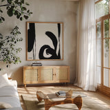 Black and White Abstract IV by Anne Tavoletti. Shown in a natural wood frame in a cozy modern living room. Available as an archival giclee rolled canvas, fine art paper, or poster print. SKU 77915a.