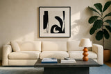 Black and White Abstract IV by Anne Tavoletti. Displayed in a glass frame with matte in a clean modern living room. Available as an archival giclee rolled canvas, fine art paper, or poster print. SKU 77915a.