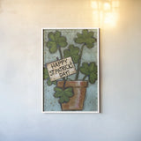 Clover Pot by Anne Tavoletti. shown as a paper print in a white frame. Available as a archival giclee rolled canvas, fine art paper, or poster print. SKU 56644h.