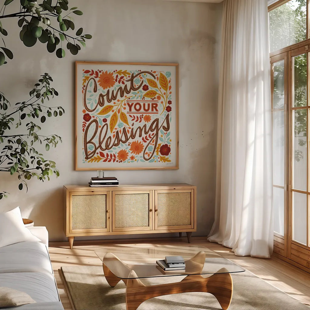 Count Your Blessings I by Anne Tavoletti. Shown in a natural wood frame in a cozy modern living room. Available as an archival giclee rolled canvas, fine art paper, or poster print. SKU 68631a.