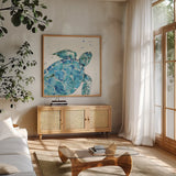 Deep Sea IX by Anne Tavoletti. Shown in a natural wood frame in a cozy modern living room. Available as an archival giclee rolled canvas, fine art paper, or poster print. SKU 46576a.