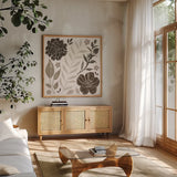 Flower Feast I Brown by Anne Tavoletti. Shown in a natural wood frame in a cozy modern living room. Available as an archival giclee rolled canvas, fine art paper, or poster print. SKU 99322a.