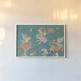 Garden Fairies Blue II by Anne Tavoletti. shown as a paper print in a white frame. Available as a archival giclee rolled canvas, fine art paper, or poster print. SKU 95342i.