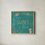 Garden Fairies Blue IX by Anne Tavoletti. Shown in a natural wood glass frame for a timeless modern aesthetic. Available as an archival giclee rolled canvas, fine art paper, or poster print. SKU 95349a.