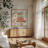 Garden Fairies IV by Anne Tavoletti. Shown in a natural wood frame in a cozy modern living room. Available as an archival giclee rolled canvas, fine art paper, or poster print. SKU 94908a.