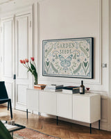 Garden Tones I by Anne Tavoletti. shown as a framed stretched canvas in a living room above a console. Available as a archival giclee rolled canvas, fine art paper, or poster print. SKU 84856i.