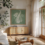 Garden Tones X by Anne Tavoletti. Shown in a natural wood frame in a cozy modern living room. Available as an archival giclee rolled canvas, fine art paper, or poster print. SKU 84865a.