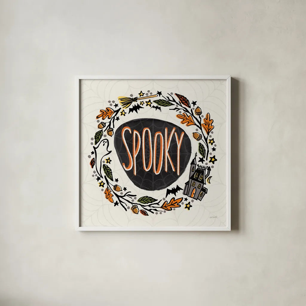 Halloween Wreath I Watercolor by Anne Tavoletti. Shown in a crisp white glass frame for a clean and minimalist style. Available as an archival giclee rolled canvas, fine art paper, or poster print. SKU 80724a.