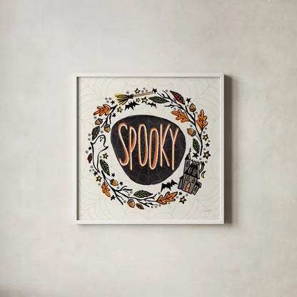 Halloween Wreath I Watercolor by Anne Tavoletti. Shown in a crisp white glass frame for a clean and minimalist style. Available as an archival giclee rolled canvas, fine art paper, or poster print. SKU 80724a.