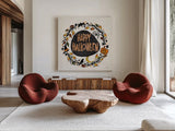 Halloween Wreath II Watercolor by Anne Tavoletti. Shown as extra-large giant wall art in a modern living room. Available as an archival giclee rolled canvas, fine art paper, or poster print. SKU 80725a.