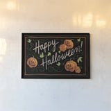 Happy Halloween Jack O Lanterns by Anne Tavoletti. shown as a paper print in a black flame. Available as a archival giclee rolled canvas, fine art paper, or poster print. SKU 67879i.