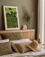 Happy St Patricks Day by Anne Tavoletti. shown as a paper print in a natural frame. Available as a archival giclee rolled canvas, fine art paper, or poster print. SKU 56646h.