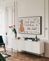 Harvest Fun I by Anne Tavoletti. shown as a framed stretched canvas in a living room above a console. Available as a archival giclee rolled canvas, fine art paper, or poster print. SKU 87200i.