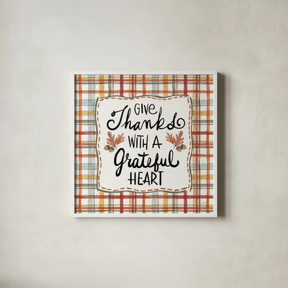 Harvest Fun II Give Thanks by Anne Tavoletti. Shown in a crisp white glass frame for a clean and minimalist style. Available as an archival giclee rolled canvas, fine art paper, or poster print. SKU 95645a.