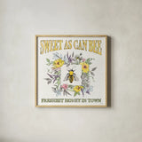 Honeybee Blossoms IV by Anne Tavoletti. Shown in a natural wood glass frame for a timeless modern aesthetic. Available as an archival giclee rolled canvas, fine art paper, or poster print. SKU 72492a.