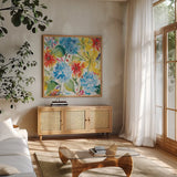July Flowers by Anne Tavoletti. Shown in a natural wood frame in a cozy modern living room. Available as an archival giclee rolled canvas, fine art paper, or poster print. SKU 59346a.