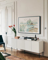 Lakehouse II on White by Anne Tavoletti. shown as a framed stretched canvas in a living room above a console. Available as a archival giclee rolled canvas, fine art paper, or poster print. SKU 24517i.