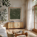 Leaf Lines II by Anne Tavoletti. Shown in a natural wood frame in a cozy modern living room. Available as an archival giclee rolled canvas, fine art paper, or poster print. SKU 97373a.