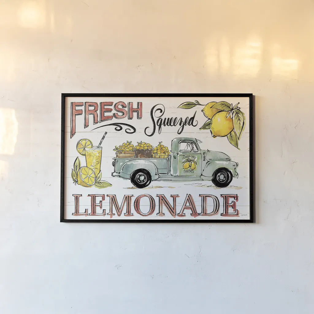 Lemonade Stand I by Anne Tavoletti. shown as a paper print in a black flame. Available as a archival giclee rolled canvas, fine art paper, or poster print. SKU 69022i.