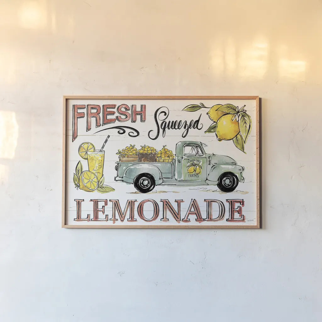 Lemonade Stand I by Anne Tavoletti. shown as a paper print in a natural frame. Available as a archival giclee rolled canvas, fine art paper, or poster print. SKU 69022i.