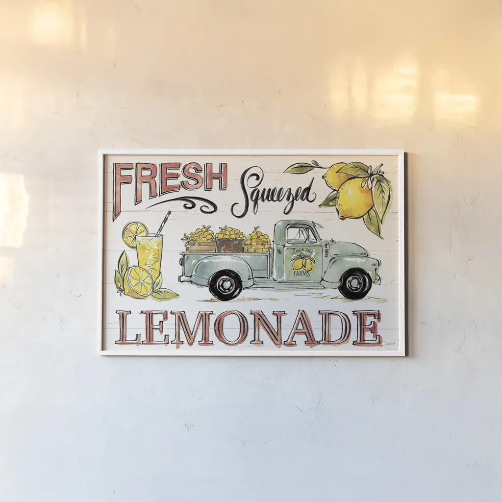 Lemonade Stand I by Anne Tavoletti. shown as a paper print in a white frame. Available as a archival giclee rolled canvas, fine art paper, or poster print. SKU 69022i.