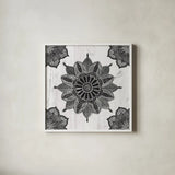 Mandala Morning VI BW by Anne Tavoletti. Shown in a crisp white glass frame for a clean and minimalist style. Available as an archival giclee rolled canvas, fine art paper, or poster print. SKU 46610a.